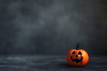 halloween themed small pumpkin on empty dark grunge background, halloween seasonal copy space, make banners, make post, make cards, empty copy space