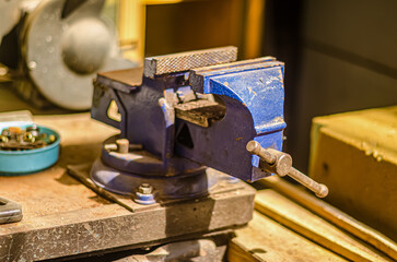 Metal clamps in workshop. Tools of precision, holding strength for crafting. High quality photo