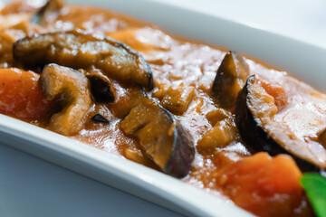 Stewed meat with vegetables and mushrooms