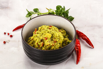 Guacamole with avocado, tomato and chili