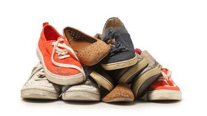 pile of old shoes isolated