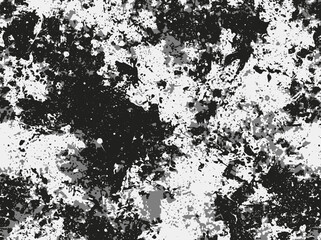Fototapeta premium a black and white photo of paint splattered on a wall