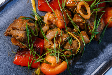 Stewed meat with vegetables and mushrooms