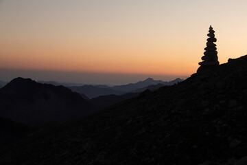 stones arranged to mark peaks in mountains