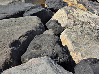 Rock gravel or pile of stones wallpaper background