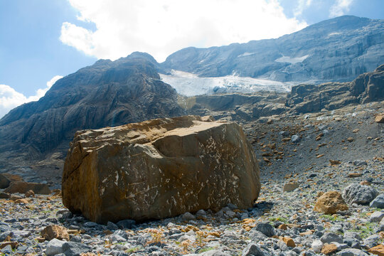 erratic stone blocks left by the action of a receding glacier