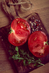 sliced tomato, on a wooden chopping board, food background, no people,