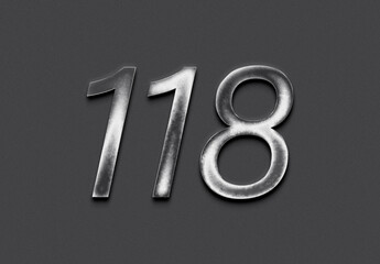 Chrome metal 3D number design of 118 on grey background.