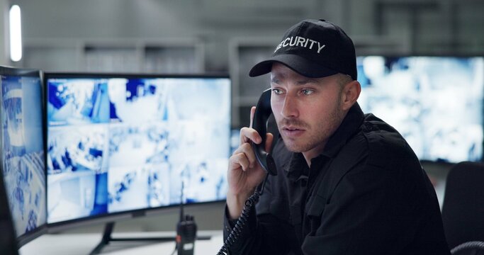 Security guard, phone call and speaking by cctv monitor for protection, building safety or data center. Inspection, video surveillance agency and control room with footage, computer and rear view - Powered by Adobe