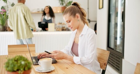 Woman, laptop and typing on smartphone in cafe, remote work and cappuccino in coffee shop for...