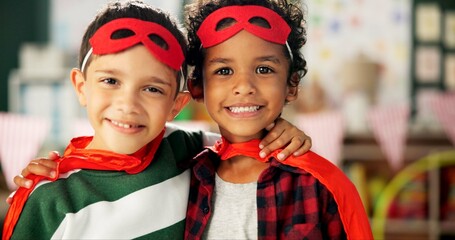 Happy boy, portrait and friends with hug in costume for cosplay, halloween or dress up at school. Children or kids with smile in superhero outfit for sidekick, friendship or support in classroom © N Lawrenson/peopleimages.com