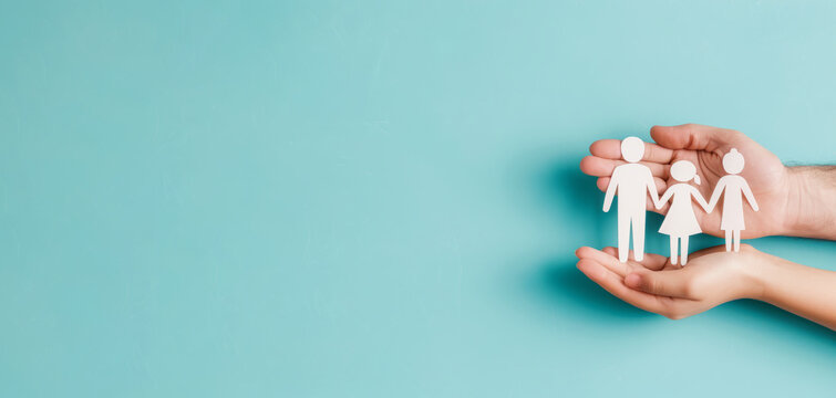Hands holding paper family on turquoise background for cover photo