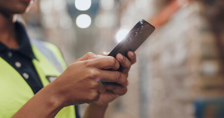 Logistics, person and phone in warehouse in communication, stock and safety in supply chain or freight. Factory, officer and industry for quality control in manufacturing, shipping in trade or export