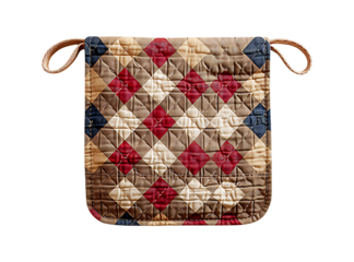 Quilted potholder with red, brown, and white pattern.