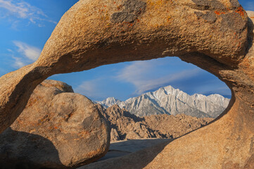 Landscape at sunrise of arch, Lone Pine Peak, and the Alabama Hills,  Eastern Sierra Nevada Mountains, California, USA