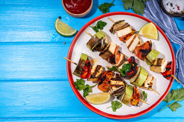 Tofu cheese kebabs on skewers with vegetables