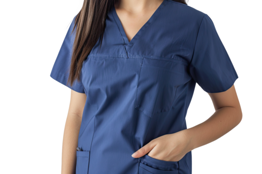 A woman in a blue medical scrub top with her hand in her pocket.