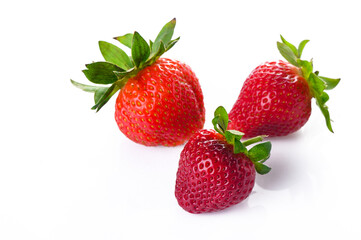 Set of ripe strawberries. Whole and cut berries isolated on white background. 1