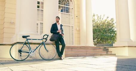 Bicycle, travel or businessman at law firm for interview, meeting or job opportunity. Carbon neutral, cycling and lawyer with eco friendly transport in London for recruitment, deal and hiring in city