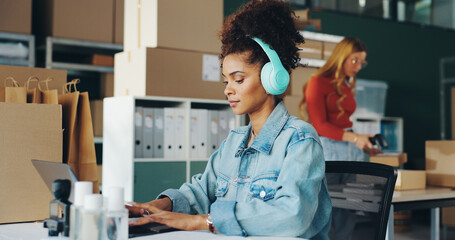 Courier business, woman and computer in office for ecommerce, online service and manage delivery....
