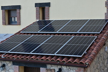 Solar panels on a house, sustainability