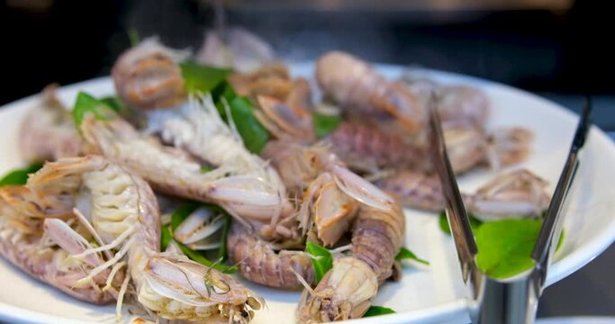 steamed crayfish or mantis shrimps or stomatopods with spicy seafood sauce