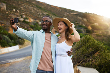 Road trip, interracial couple and smile for selfie in nature, travel or countryside for vacation in Brazil. Love, people and happy with social media for picture for holiday, journey or drive together