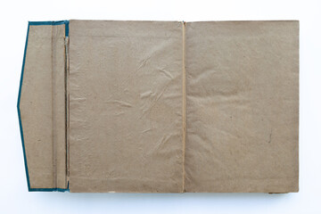 inner page of a very old book. yellowed natural paper texture. on isolated white background. clean close-up.