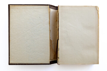 inner page of a very old book. yellowed natural paper texture. on isolated white background. clean close-up.