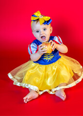 Baby girl wearing a costume