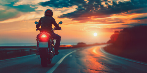 Biker riding motorcycle into the sunset