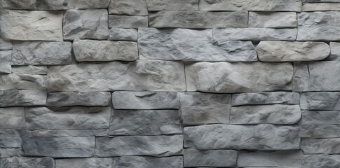 stone tile textured wall with a large gray rock in the foreground