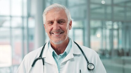 Face, healthcare and medicine with doctor smiling in hospital for treatment or insurance. Portrait, medical man and trust with cardiology professional and clinic for appointment or gp check up