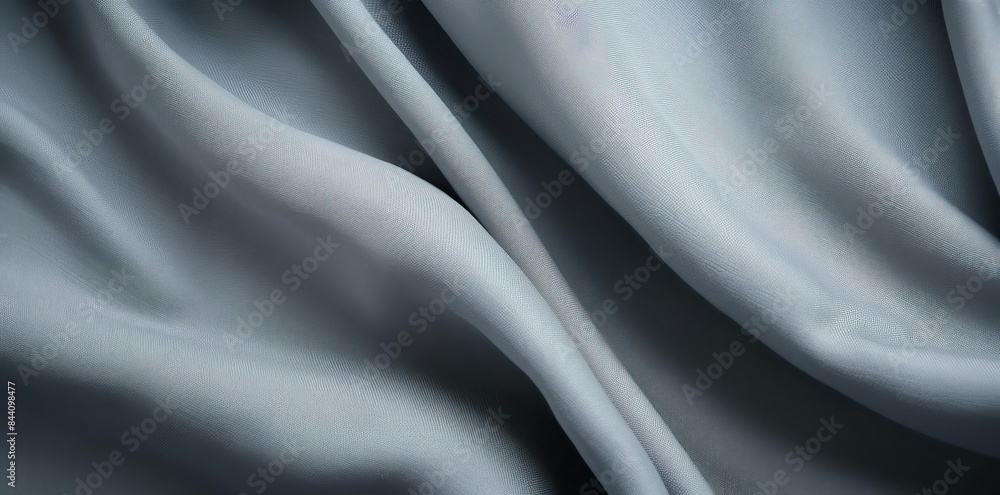 Poster grey fabric texture as a background a row of objects including a vase, a jar, and a pair of glasses,