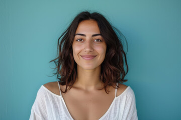 Fototapeta premium A close up portrait of a young woman with a subtle smile