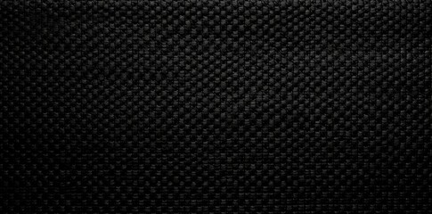 black textile texture as a background a close - up of a black fabric with a white stripe, surrounded by a white circle and a black square