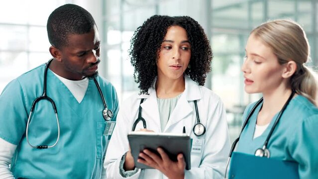 Tablet, doctors and team in discussion in meeting for healthcare, brainstorming and mentor training nurse intern. Group, medical people and planning on technology for collaboration in hospital clinic