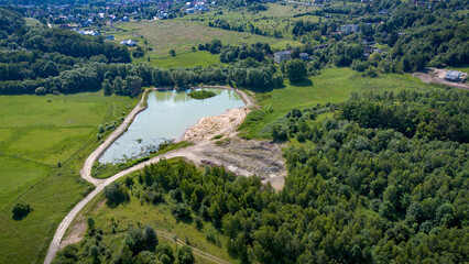Aerial View of Green Forest and Field