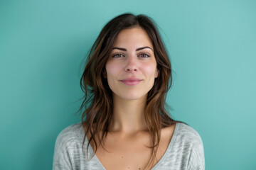 Fototapeta premium A close up portrait of a young woman with a subtle smile