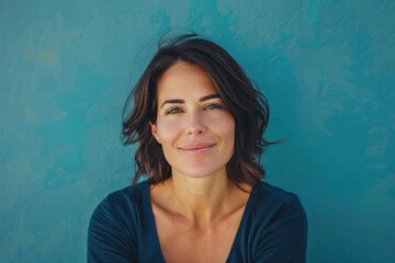 Fototapeta premium A close up portrait of a young woman with a subtle smile