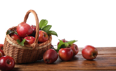 Ripe red apples and leaves on wooden table against white background