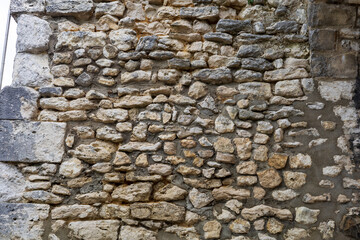 Irregular Stone Wall with Mixed Color Bricks