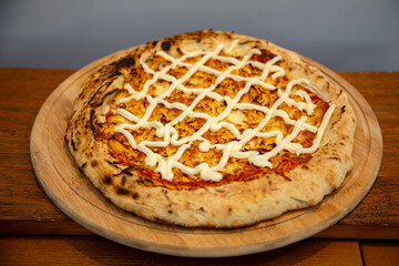 Traditional Brazilian chicken pizza with catupiry