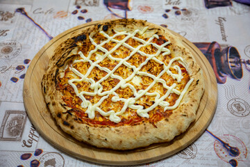 Traditional Brazilian chicken pizza with catupiry