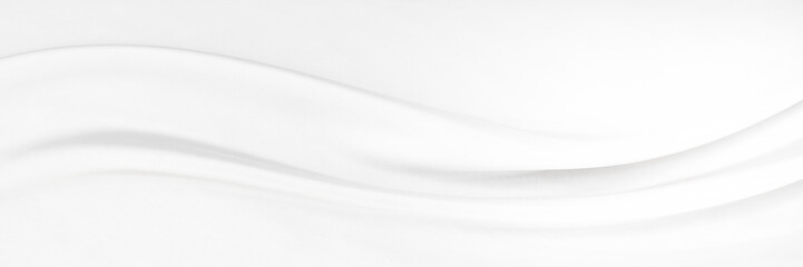 White gray satin texture that is white silver fabric silk panorama background with beautiful soft blur pattern natural.
