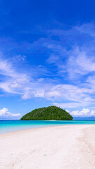 Bonbon Beach white sand on a sunny day. Portrait. Romblon Island, Philippines