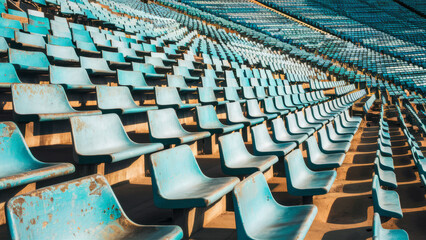 Obraz premium Old Blue Seats in Empty Stadium