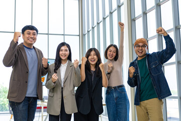 Fototapeta premium Happy diverse group Asian business start up freelance team analyzing statistics financial. Group Team of business people meeting conference discussion various topic corporate concept in office.