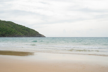 Beautiful Soft blue ocean wave on fine sandy beach