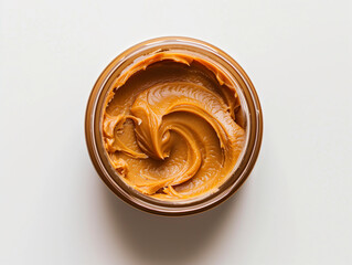 Arrange a Clear Nut Butter Jar Against a Plain White Background - Simple Elegance